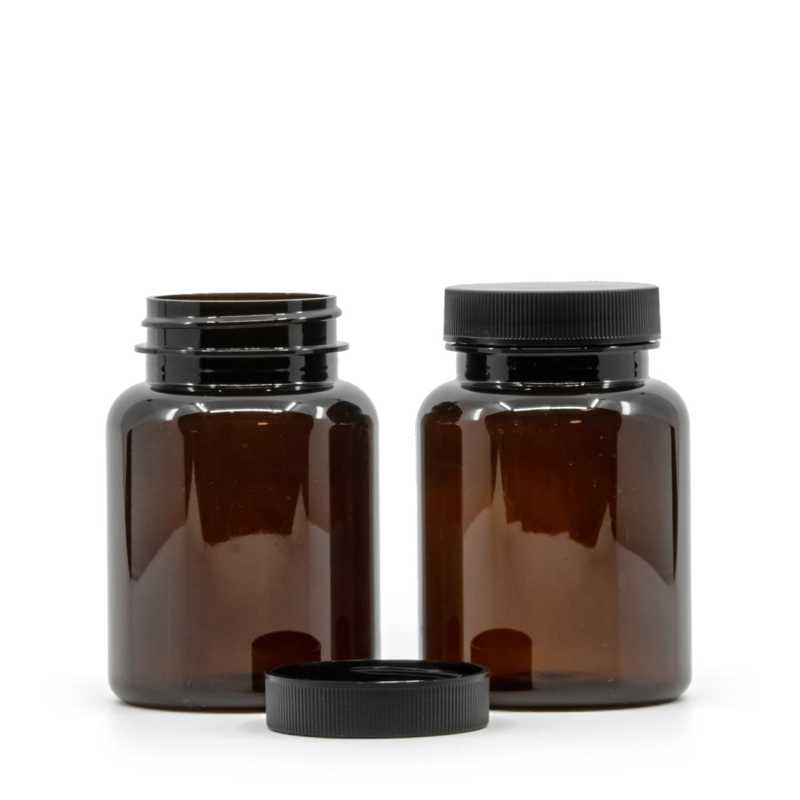 Bernsteinfarbenes Kunststoff-Pillenglas mit schwarzem Deckel, 150 ml