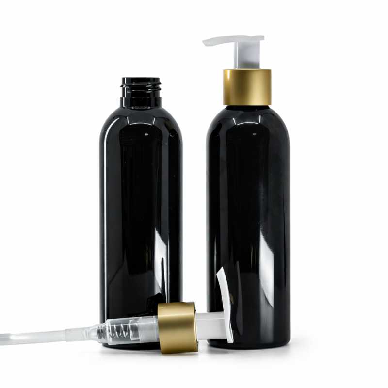 Schwarze glänzende Kunststoffflasche mit weißer Lotionpumpe und mattem goldfarbenem Ring, 200 ml