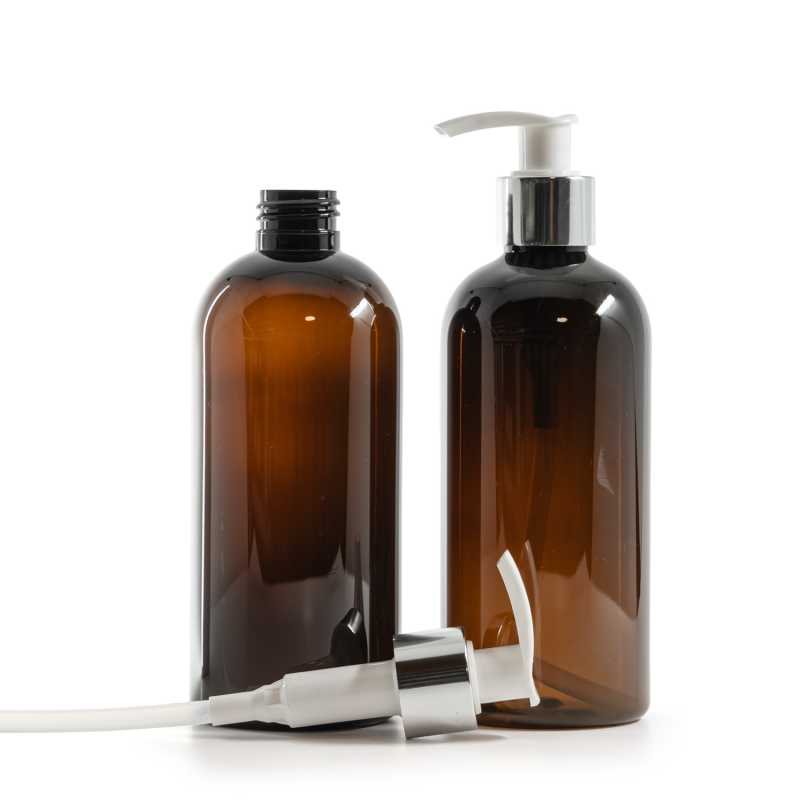 Bernsteinfarbene Kunststoff-Flasche, weiße Lotion-Pumpe mit glänzendem Silberkragen, 300 ml