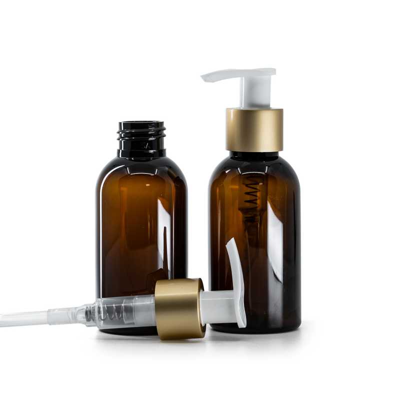 Braune Kunststoffflasche, weißer Lotionpumpspender mit mattem Goldkragen, 100 ml