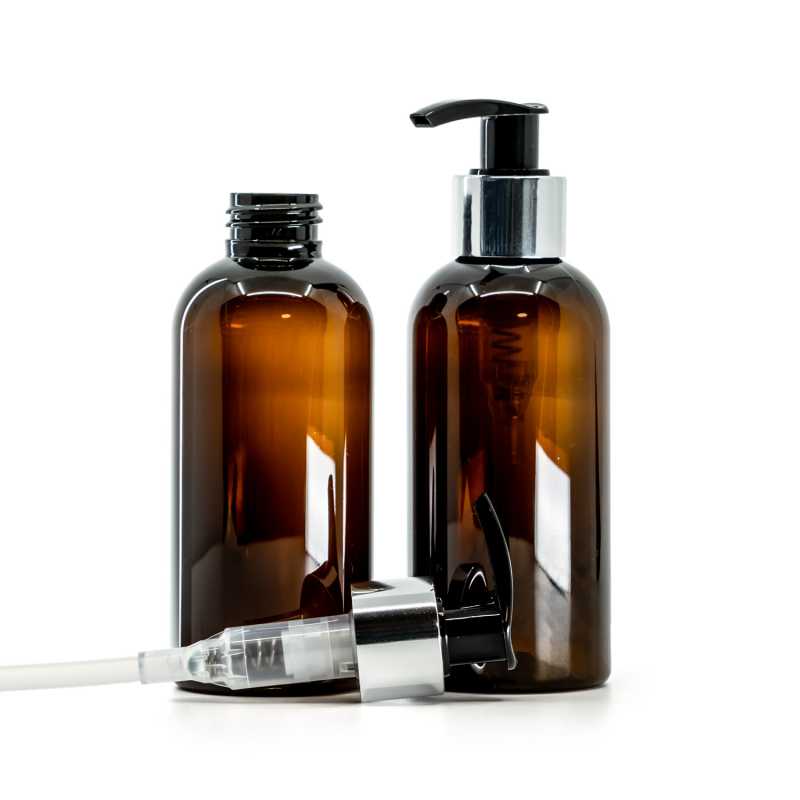 Bernsteinfarbene Kunststoffflasche, schwarze Lotion-Pumpe mit glänzendem Silberkragen, 150 ml