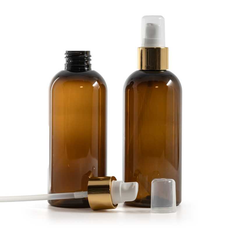 Bernsteinfarbene Kunststoffflasche, weiße Lotionpumpe mit Überkappe, goldglänzend, 200 ml