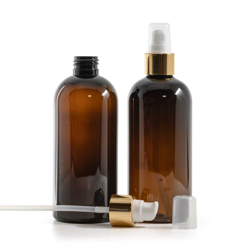 Bernsteinfarbene Kunststoffflasche, weiße Lotionpumpe mit Überkappe, goldglänzend, 300 ml