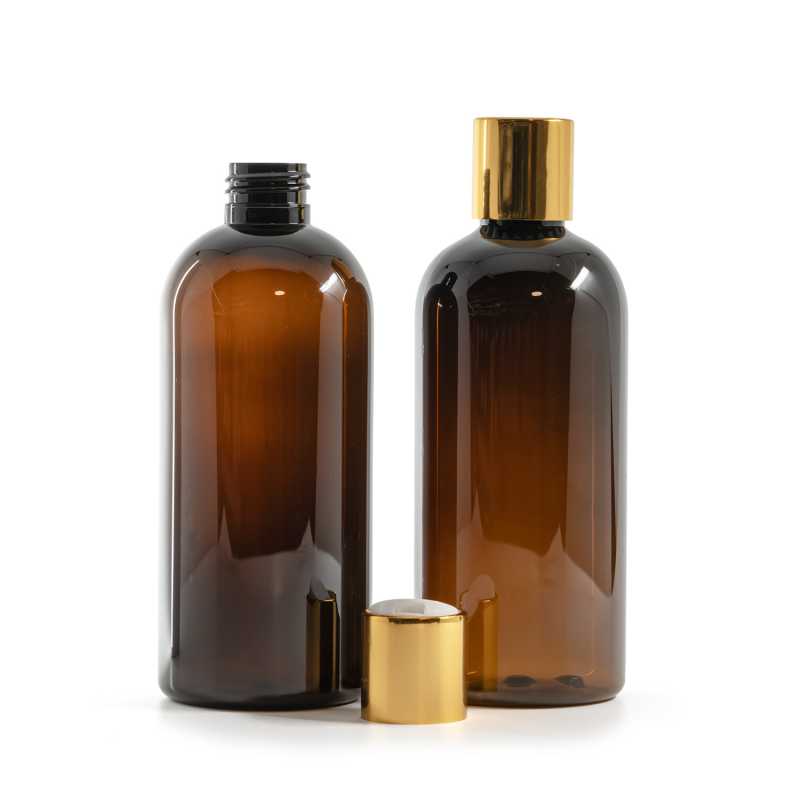 Bernsteinfarbene Kunststoffflasche, weißer Kunststoff-Kippverschluss mit goldenem Aluminiumkragen, 3