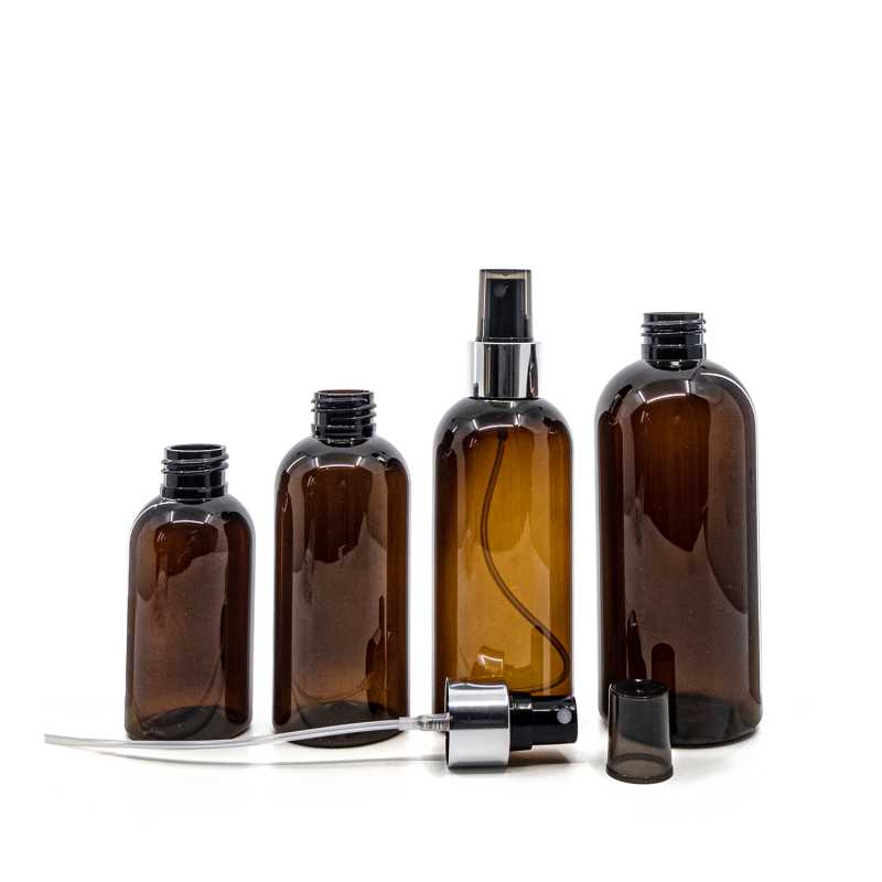 Bernsteinfarbene Kunststoffflasche, schwarzes Spray mit glänzendem Silberkragen, 200 ml