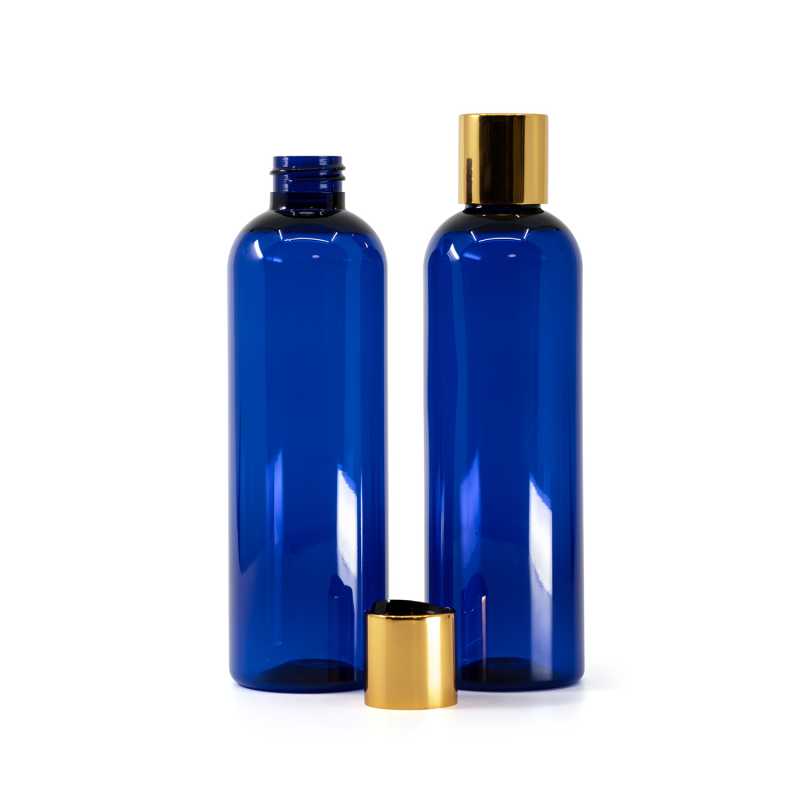 Blaue Kunststoffflasche, schwarzer Kunststoff-Kippverschluss mit goldenem Aluminiumkragen, 250 ml