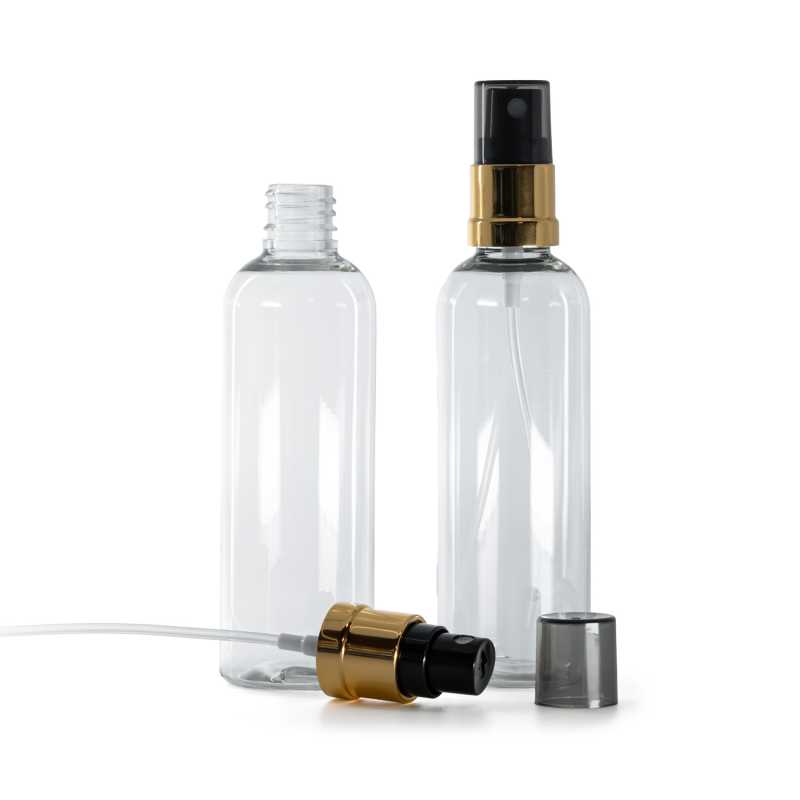 Transparente Kunststoffflasche, schwarz-goldener Sprüher, rauchfarbene Überkappe, 100 ml