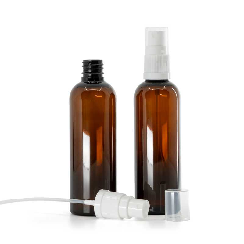 Bernsteinfarbene Kunststoffflasche, weißes Spray, 100 ml