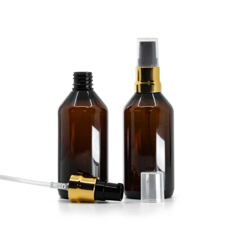 Bernsteinfarbene Kunststoffflasche, glänzende gold-schwarze Pumpe mit durchsichtiger Kappe, 115 ml