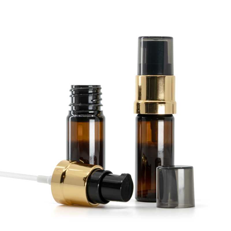 Bernsteinfarbene Kunststoffflasche, glänzende gold-schwarze Pumpe, 10 ml