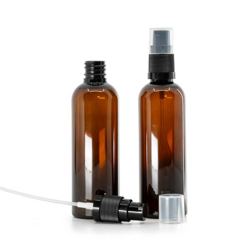 Bernsteinfarbene Kunststoffflasche, schwarze Lotionpumpe, 100 ml