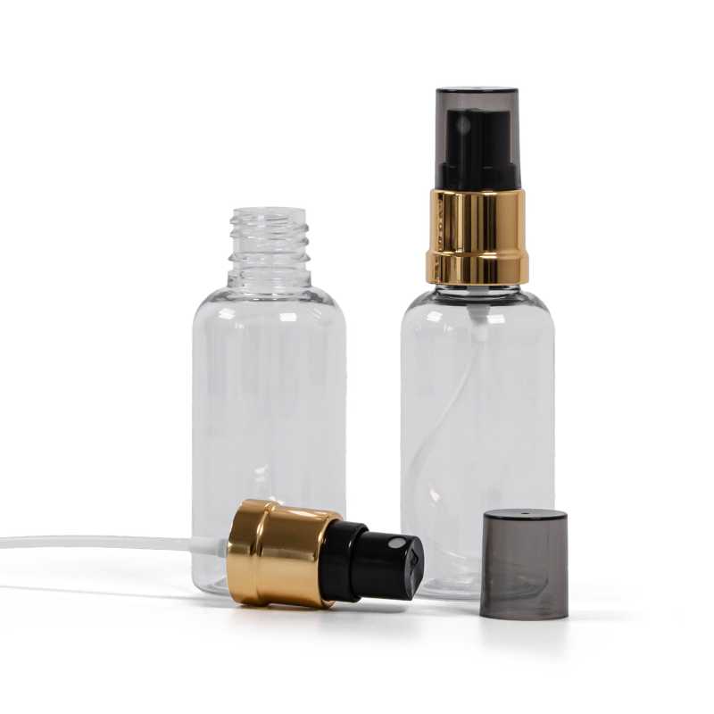 Kunststofffläschchen, transparent, schwarz-goldener Sprühzerstäuber, rauchfarbene Überkappe, 50 ml