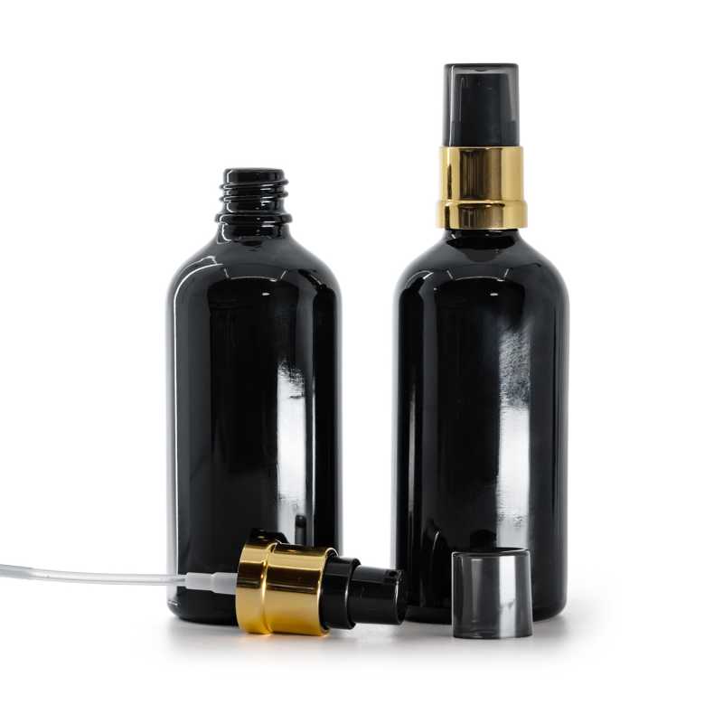 Schwarzes glänzendes Glasfläschchen, schwarz-goldene glänzende Pumpe mit rauchfarbener Überkappe, 10