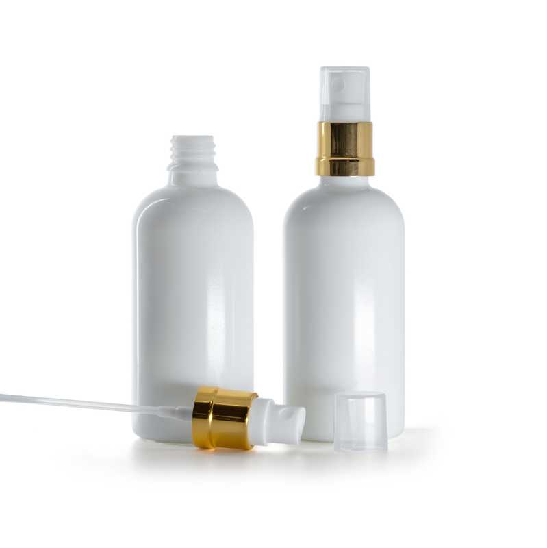Weißglasflasche, goldglänzende Sprühdose, 100 ml