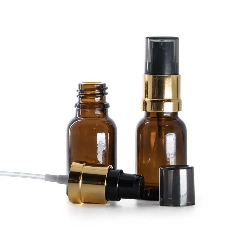 Braunes Glasfläschchen, schwarz‑goldene glänzende Pumpe mit rauchfarbener Überkappe, 15 ml