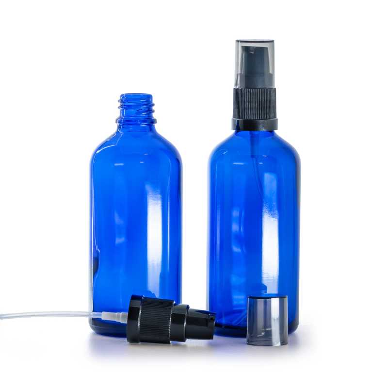 Blaue Glasflasche mit Lotionpumpe und Rauchkappe, 100 ml