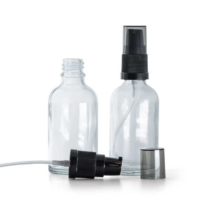 Glasflasche klar mit Creme-Dosierpumpe und rauchfarbener Überkappe 30 ml