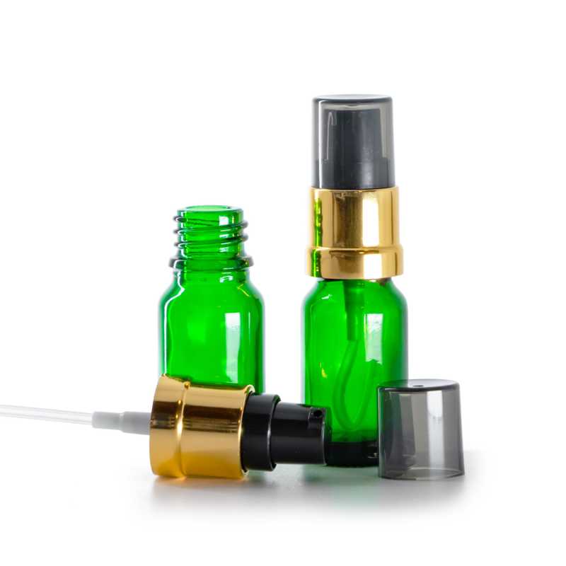Grünes Glasfläschchen, glänzender schwarz-goldener Dispenser mit rauchfarbener Überkappe, 10 ml