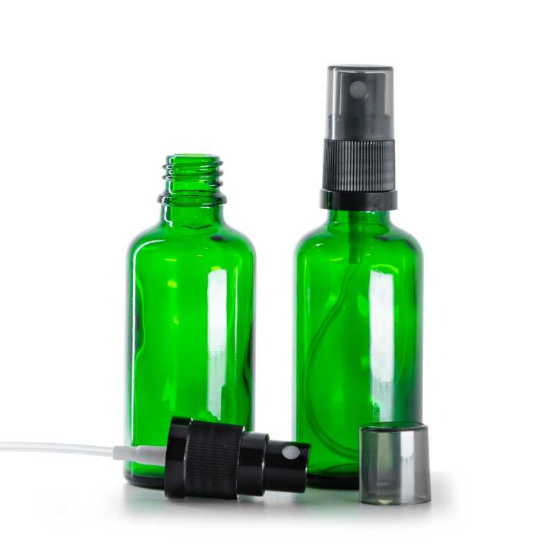 Grünes Glasfläschchen, schwarzer Sprühzerstäuber, rauchfarbene Überkappe, 50 ml