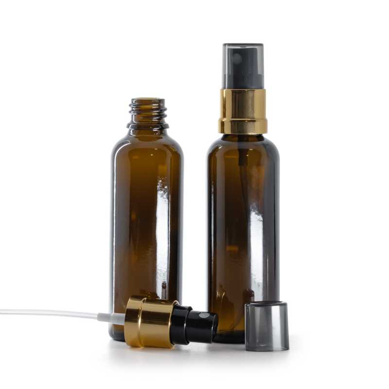Braunes Glasfläschchen, schlank, schwarz-goldener Zerstäuber mit rauchfarbener Überkappe, 50 ml